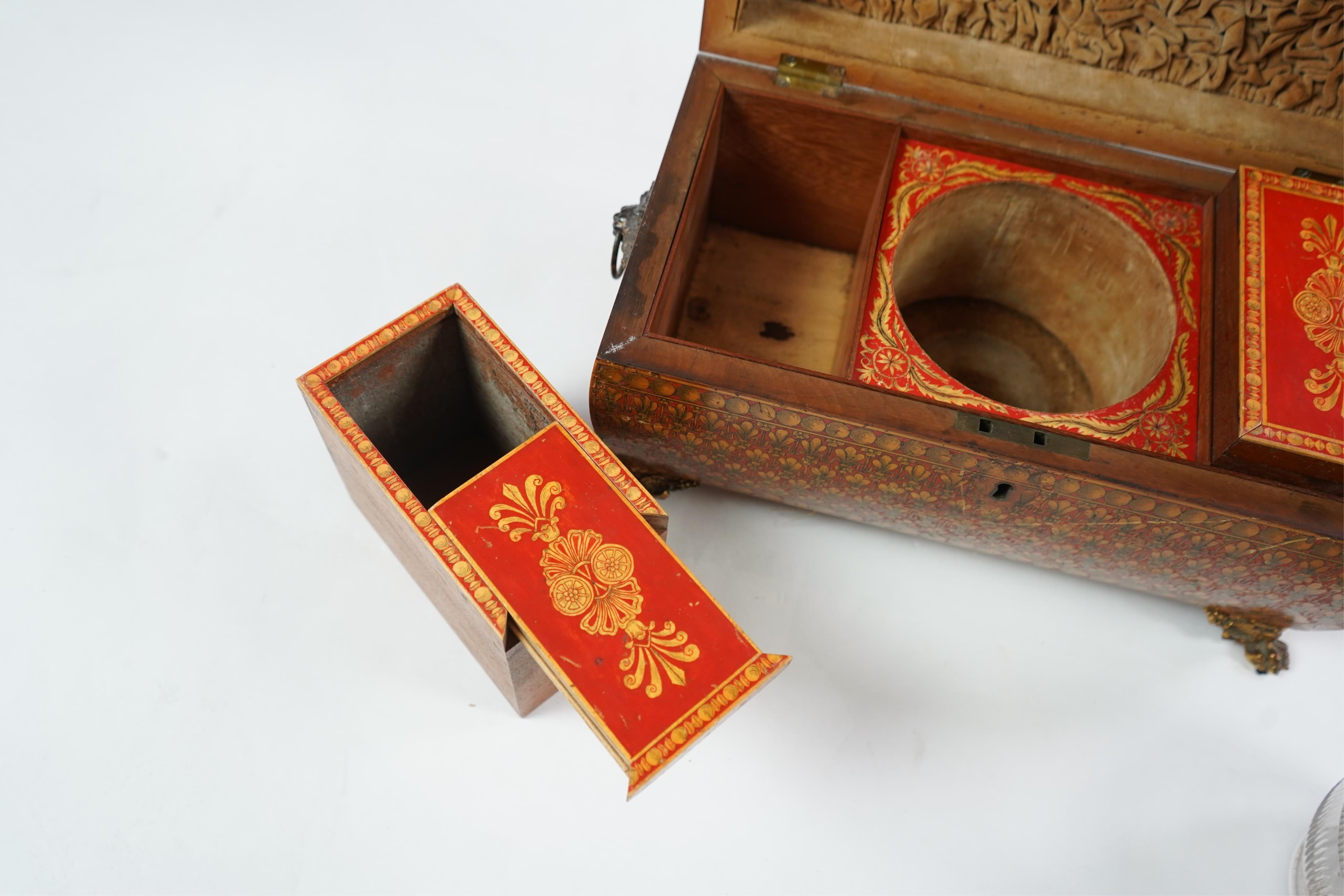 A Regency red lacquer penwork tea caddy
